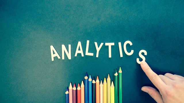 pencils pointing to the word analytics