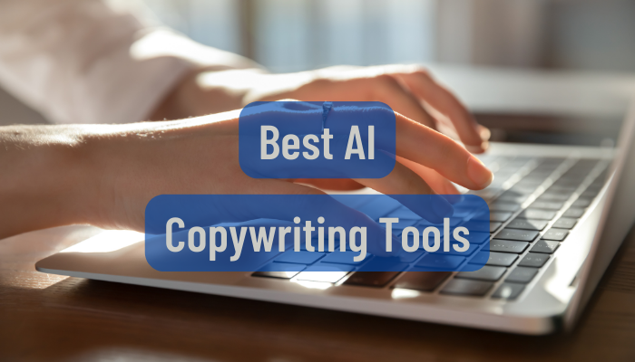 A person typing on a computer while using the best AI copywriting tools